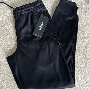 Mens Reebok soccer pants. New size small.